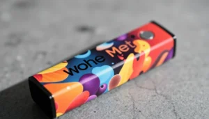 Experience smooth hits with Whole Melt Disposable featuring colorful flavor branding and a sleek, portable design for easy vaping.